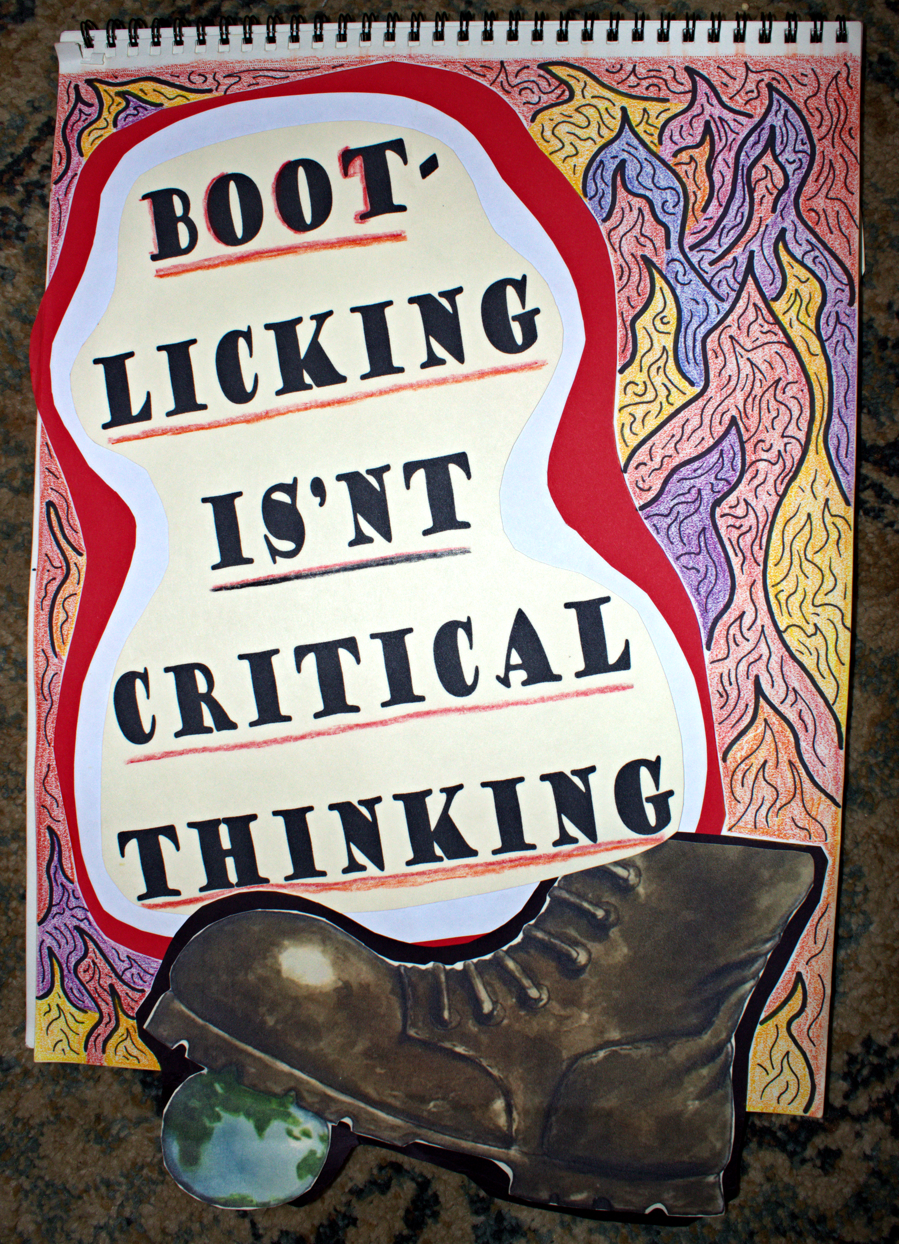 A photo of a black boot, crushing the Earth with the phrase bootlicking isn't critical thinking, encased in flames.