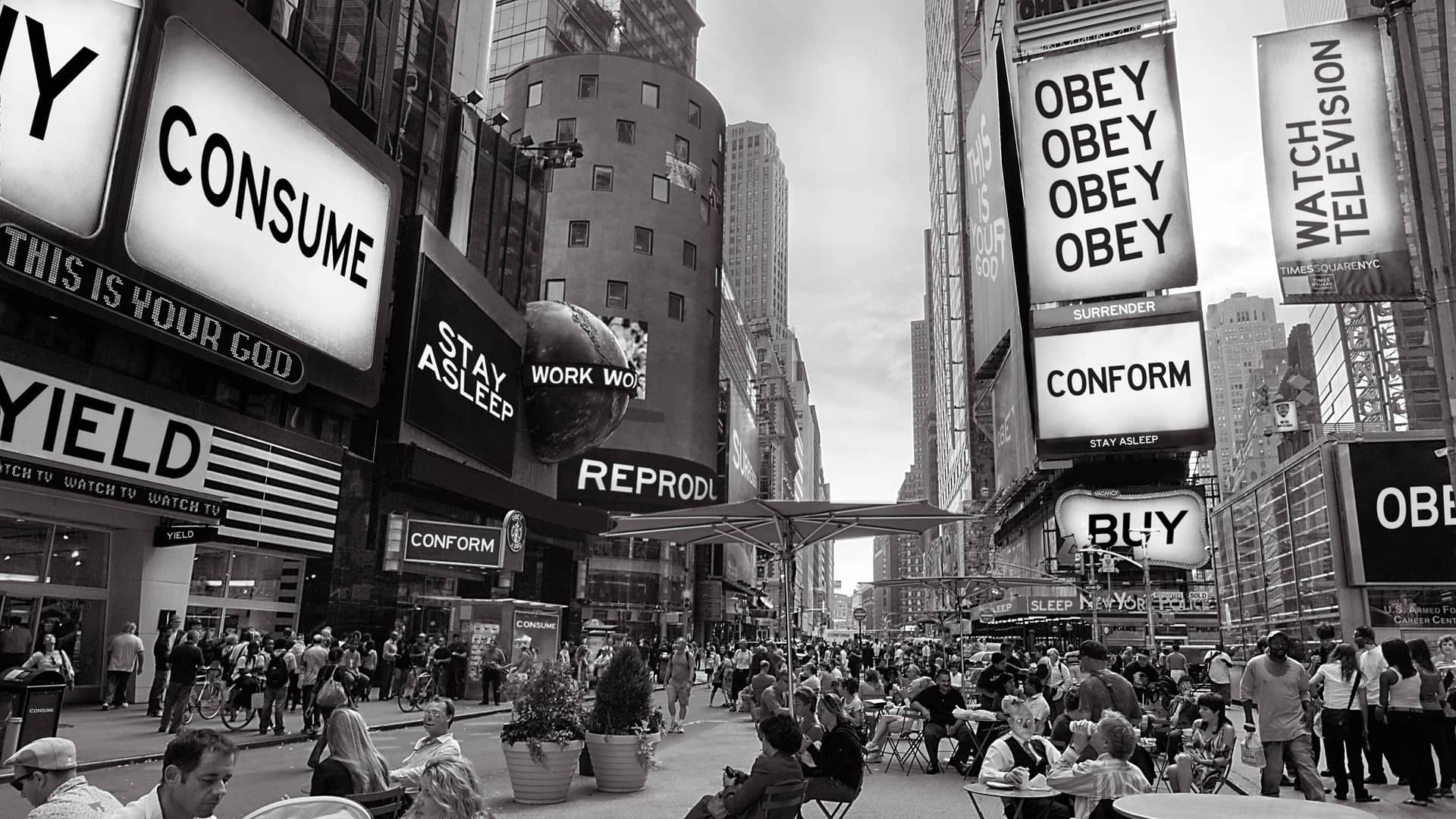 From film, They Live, billboards everywhere saying Obey and Consume.
